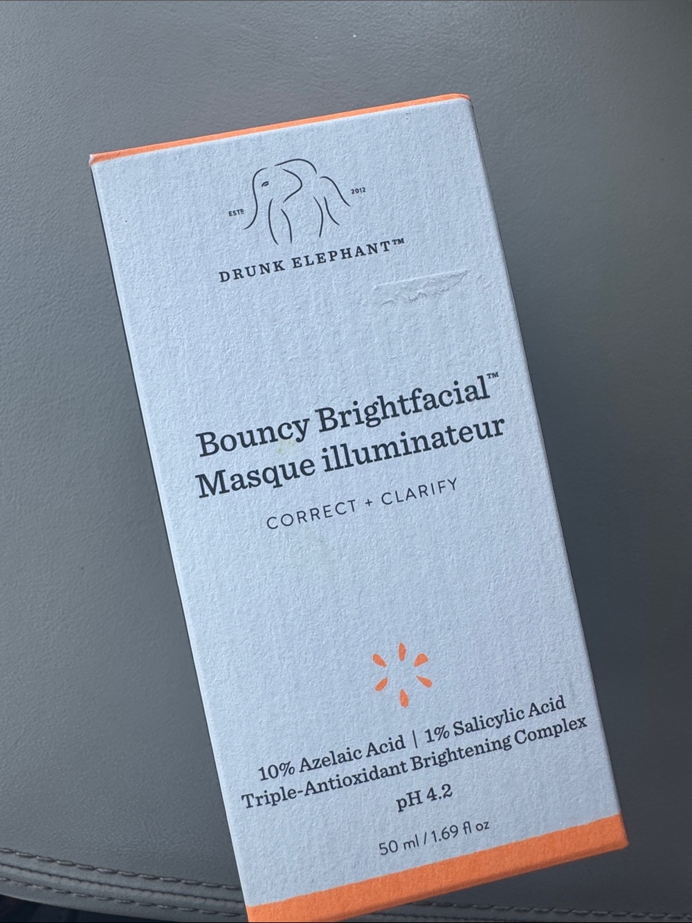 Drunk Elephant Bouncy Brightfacial Box — White & Orange Accents